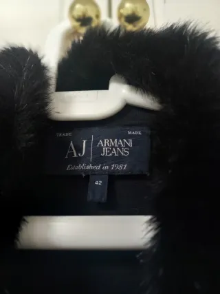 Abrigo rayas pelo sintético negro y blanco