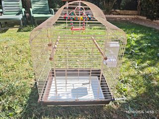 Jaula para pájaros beige y multicolor