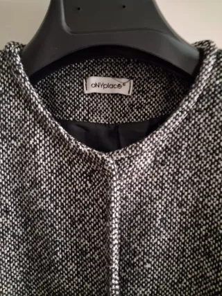 Cappotto tweed con polsini pelliccia sintetica