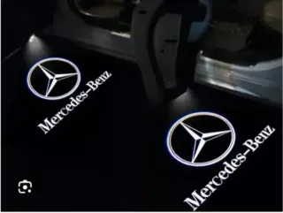 MERCEDES BENZ LUZ CORTESÍA LOGO MERCEDES 2 unids