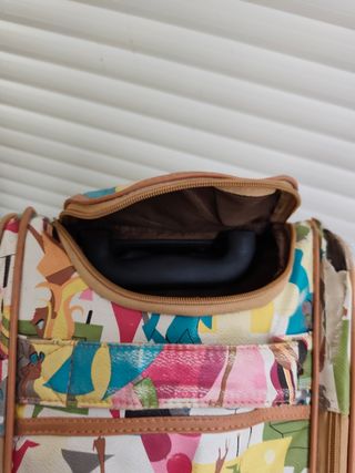 Maleta elegante con estampado de figuras