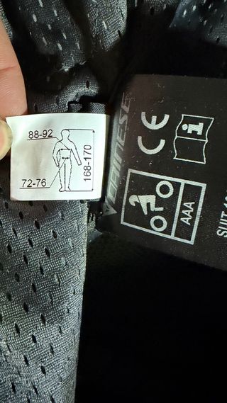 Mono Dainese Mujer Negro/Blanco/Rosa muy cuidado