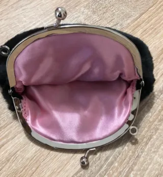 Borsa pochette in pelliccia ecologica nera