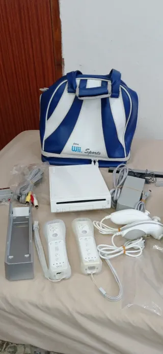 Lote Nintendo Wii con 6 giochi, 2 controller e borsa