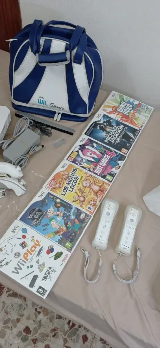 Lote Nintendo Wii con 6 giochi, 2 controller e borsa