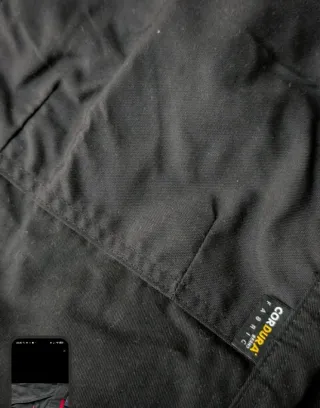 Pantalones Parkside negros con detalles rojos