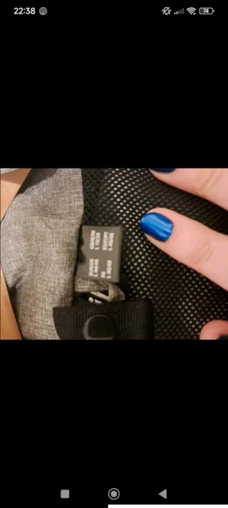 Cortavientos hombre gris y amarillo