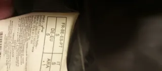 Plumas gris con capucha