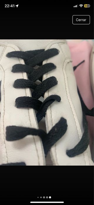 Zapatillas blancas con estrella y brillo