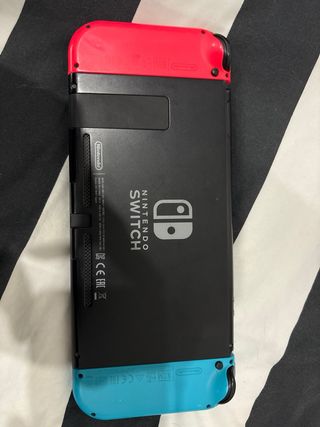 Nintendo Switch + Accessori + Cuffie