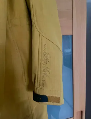 Abrigo amarillo Human Nature