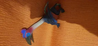 Juguete dinosaurio esqueleto azul