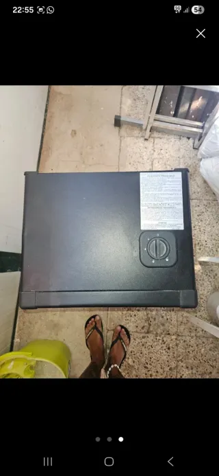 Estufa de gas negra y plateada