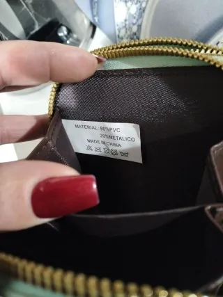 Borsello donna verde con dettagli oro