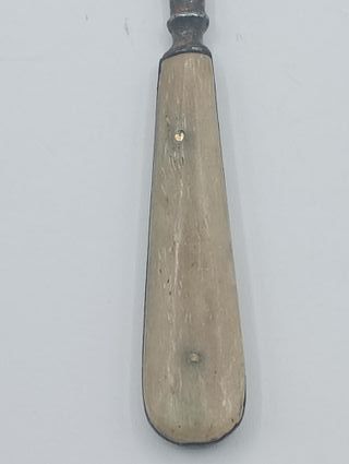 Gancho antiguo para botones