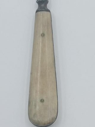 Gancho antiguo para botones