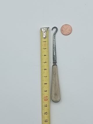 Gancho antiguo para botones