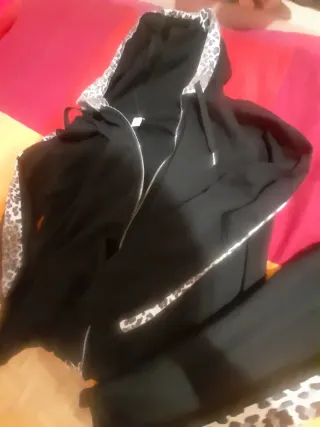 Tuta donna M nera con stampa leopardata