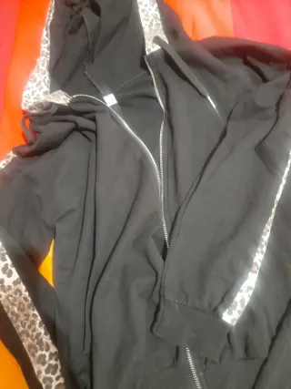 Tuta donna M nera con stampa leopardata