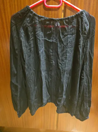 Blusa transparente negra