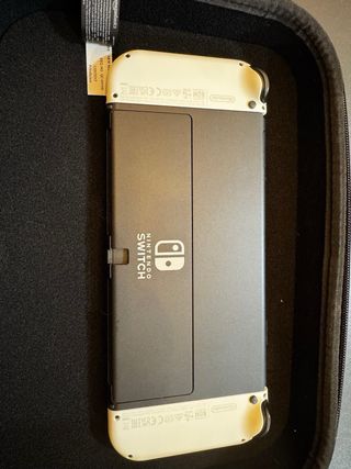 Nintendo Switch OLED + 5 giochi + custodia (come nuova)