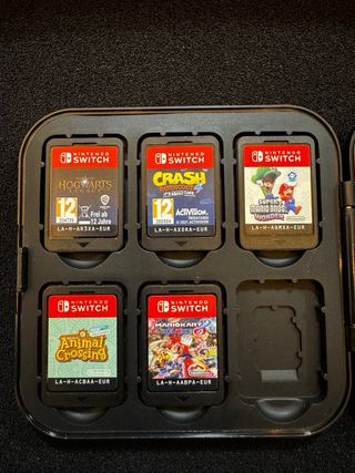 Nintendo Switch OLED + 5 giochi + custodia (come nuova)