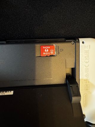 Nintendo Switch OLED + 5 giochi + custodia (come nuova)