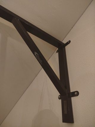 Saco de boxeo y soporte de pared