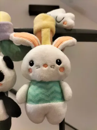 Espiral de peluches para cochecito o cuna