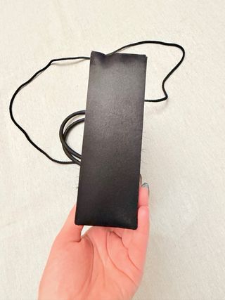 Bolso de fiesta negro con plumas