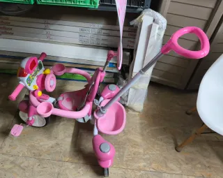 Triciclo rosa per bambina con spintore