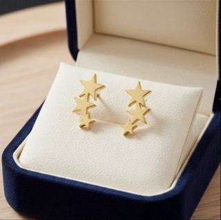 Pendientes de oro con diseño de estrellas