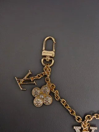 Portachiavi Louis Vuitton Oro con Charms