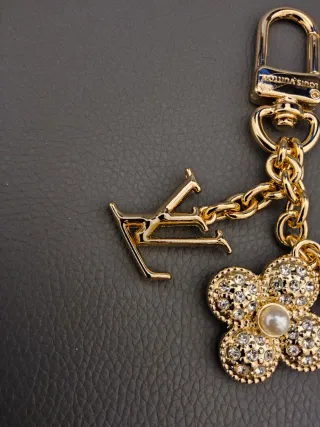 Portachiavi Louis Vuitton Oro con Charms