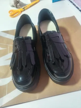 Zapatos negros plataforma flecos