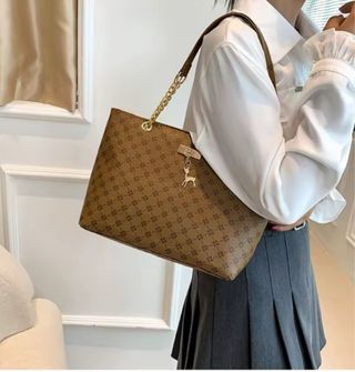 Bolso de mano de lujo con cadena