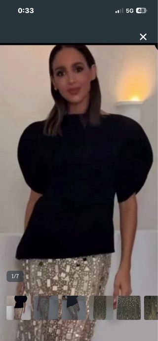 Top Zara manga abullonada asimétrica