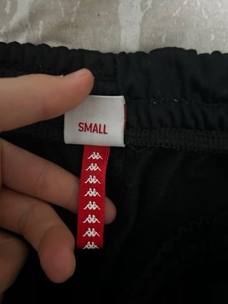 Pantaloni Kappa neri con banda laterale