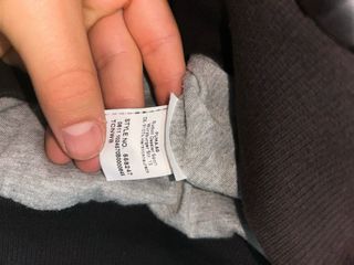 Piumino Puma nero con bande bianche