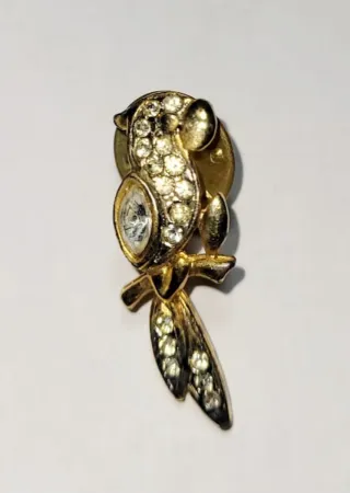 Pin loro con diamantes