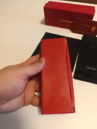 Gafas de sol Cartier negras y doradas