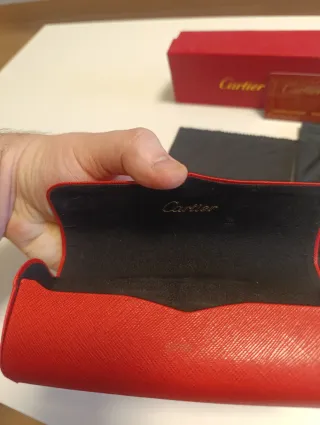 Gafas de sol Cartier negras y doradas