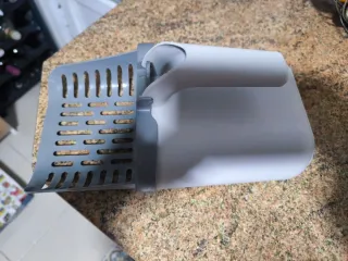 Pala para arenero de gato