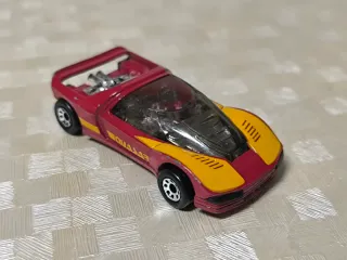 Coche de juguete peugeot Quasar rojo y amarillo ma