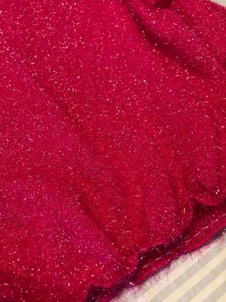 Maglione fucsia effetto lucido