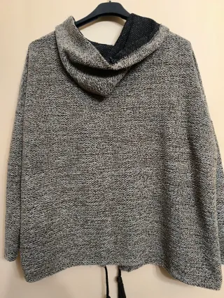 Sudadera gris y negra con estrella