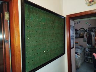 Cuadro expositor de tela y madera