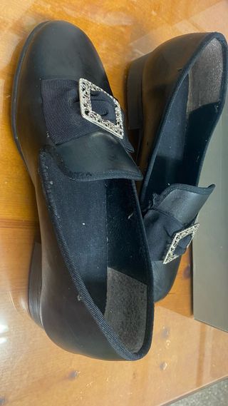 Zapatos fallero negros con hebilla tengo  2 pares