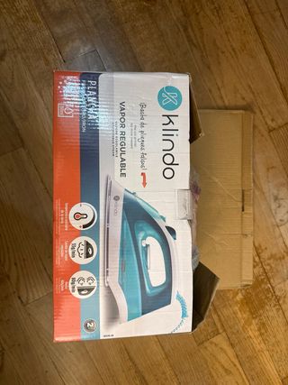 Plancha de vapor azul y blanca