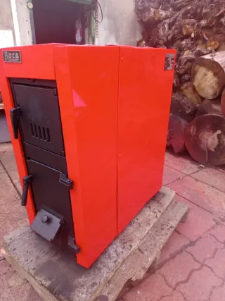 Caldera de leña Roca